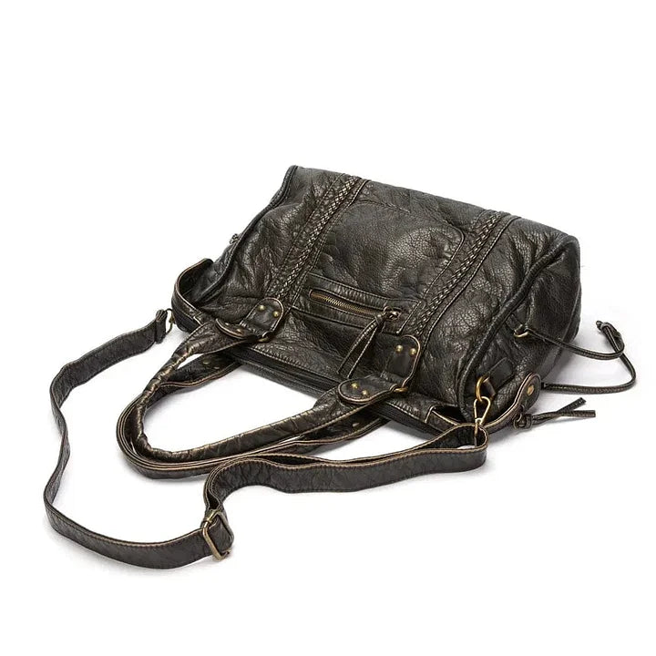 Elegante bolso de cuero negro vintage