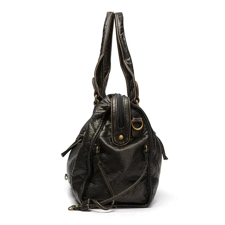 Elegante bolso de cuero negro vintage