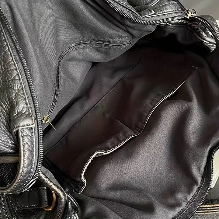 Elegante bolso de cuero negro vintage